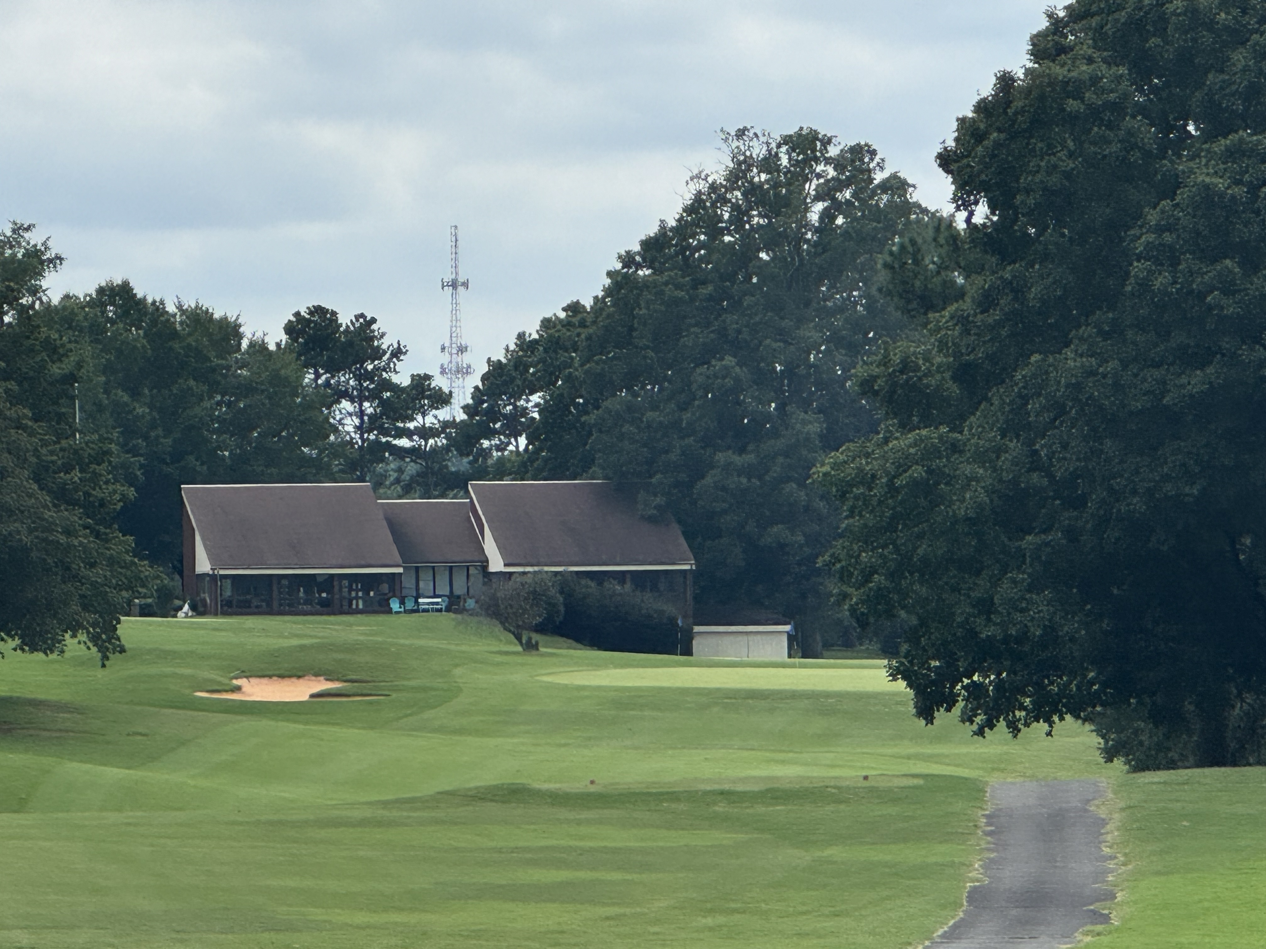 View of clubhouse from hole 15 with cart path in distance